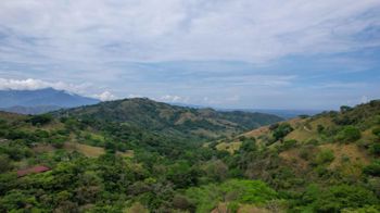 Hermosa propiedad de 50 acres adyacente a una piscina natural. in Desmonte, San Mateo, Alajuela — $600,000 - Photo 2 of 20
