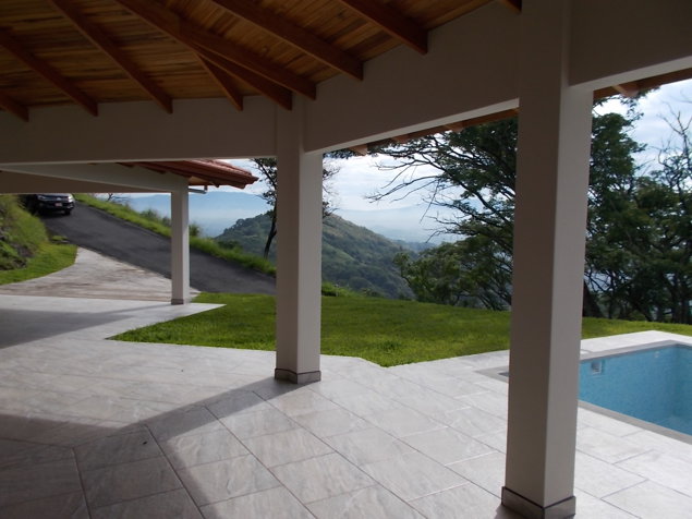Casa Roca Verde en Atenas con acabados modernos y tradicionales in Atenas, Alajuela — $629,000 - Photo 3 of 24