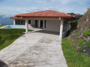 Casa Roca Verde en Atenas con acabados modernos y tradicionales en Atenas, Alajuela — $629,000 - Foto 4 de 24