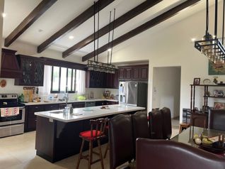 Venta de casa moderna con piscina interna y gimnasio #27-624 GS en Uruca, Santa Ana, San José — $750,000 - Foto 5 de 12