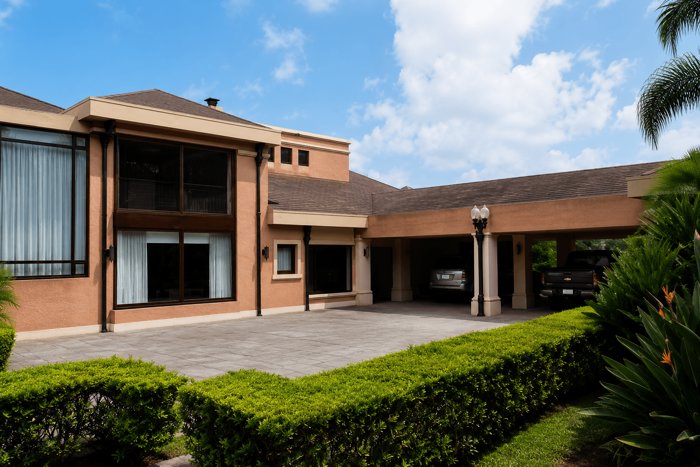 Villa Madeiras – Exclusiva Residencia de Lujo en Condominio Monterán in Pavas, San José — $1,550,000 - Photo 2 of 19