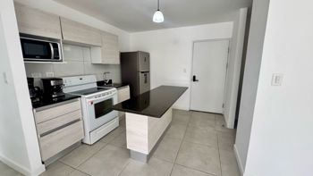 Venta Apartamento Primer Piso Línea Blanca y Jardín en Curridabat en Granadilla, Curridabat, San José — $160,000 - Foto 2 de 38