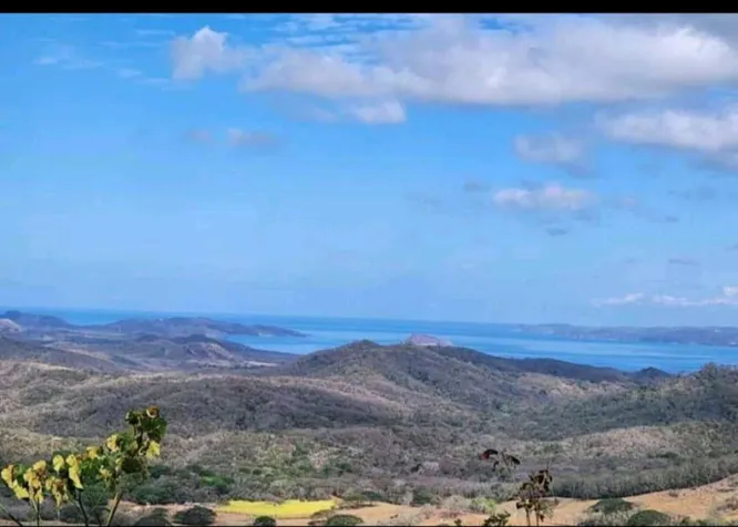 VENTA TERRENO EN LA CRUZ GUANACASTE SOBRE RUTA INTERMERICANA en La Cruz, Guanacaste — $250,000
