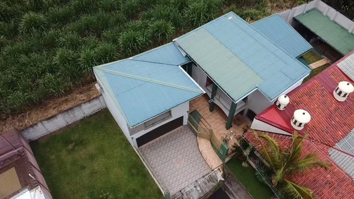 Hermosa casa en dos niveles muy cerca del centro de Grecia in Grecia, Alajuela — $299,000 - Photo 2 of 30