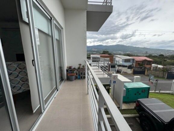 Se alquila espacioso apartamento en condominio de Pozos Santa Ana 26-290 en Pozos, Santa Ana, San José — $1,200