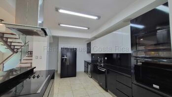 Casa moderna con terraza, jardín y amenidades premium en condominio #26-1706 GS in Piedades, Santa Ana, San José — $360,000 - Photo 4 of 20