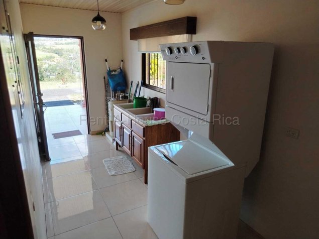 Venta de finca con casa moderna, piscina y amplias áreas verdes #26-1597 GS in San Isidro, Alajuela — $648,000 - Photo 3 of 8