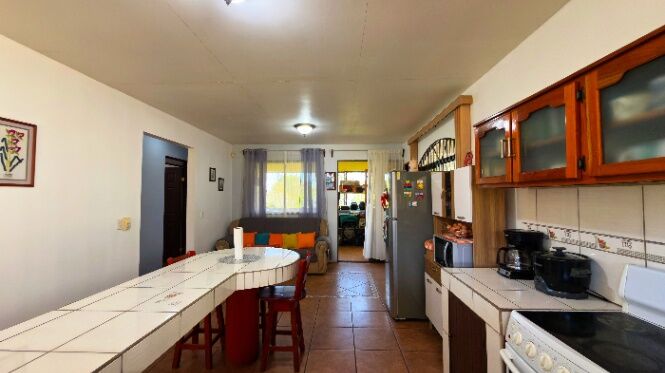 VENTA DE CASA CON LOTE PLANO EN LA BONITA DE RIVAS, PEREZ ZELEDON: PREPARADA PARA 2 PLANTAS in San Isidro De El General, Pérez Zeledón, San José — $160,000