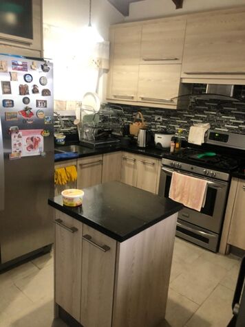 SE VENDE BELLA PROPIEDAD CON CASA Y 3 APARTAMENTOS EN HEREDIA.  in San Isidro, Heredia — $500,000