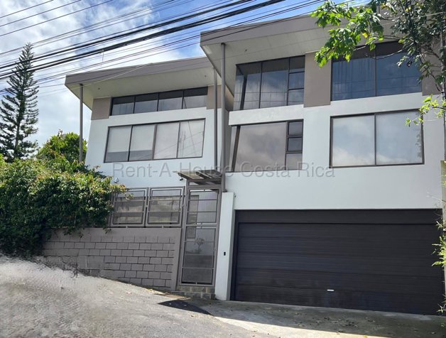 Venta de Elegante Casa con Vista en San Rafael de Heredia #27-223 GS en Ángeles, San Rafael, Heredia — $260,000