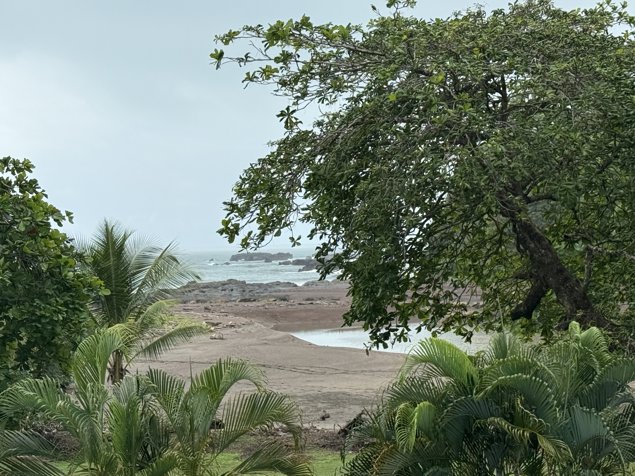 Impresionante vista al océano, río y montaña en Jacó, Garabito, Puntarenas — $450,000 - Foto 1 de 31