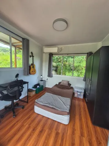 2 casas contenedores con rio pristina, Guadalajara, Buenos Aires. in Buenos Aires, Puntarenas — $154,999 - Photo 2 of 13