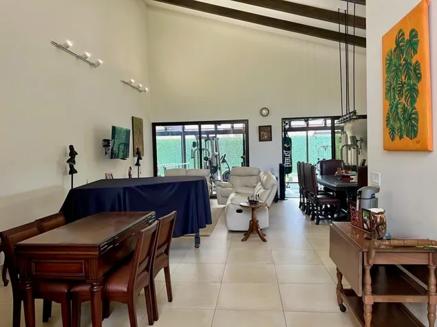 Venta de casa moderna con piscina interna y gimnasio #27-624 GS en Uruca, Santa Ana, San José — $750,000 - Foto 3 de 12