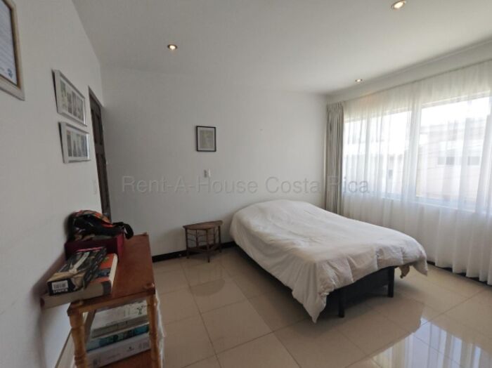Venta | Casa moderna con amplio patio y balcón en condominio en Moravia #26-1886 GS en San Vicente, Moravia, San José — $220,000