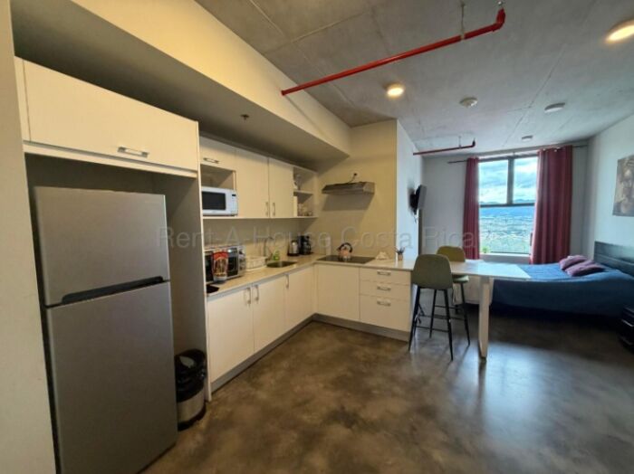 Venta | Studio amueblado en URBN Escalante con excelente potencial de inversión #27-39 GS en Carmen, San José — $140,000