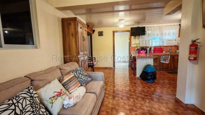 Venta de propiedad con 2 casas, zonas verdes y ruta principal #26-2266 GS in La Virgen, Sarapiquí, Heredia — $350,000