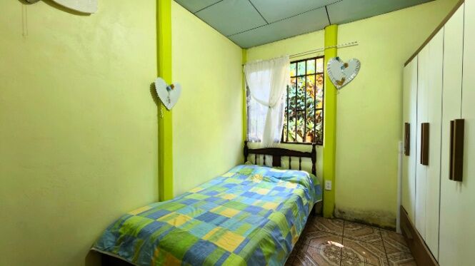 CASA DE 3 HABITACIONES EN AMPLIO LOTE DE 1.158 M2 EN PAVONES, PEREZ ZELEDON en El General, Pérez Zeledón, San José — $96,000