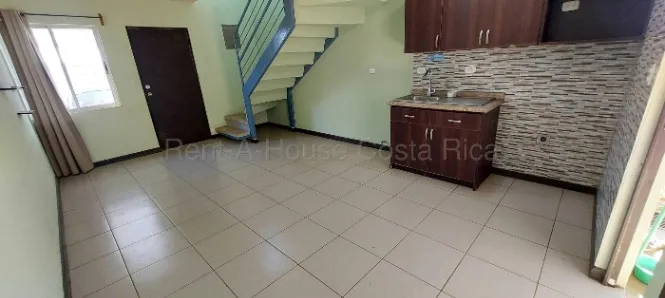 Venta de casa esquinera en condominio con patio en San Pablo de Heredia #26-1636 GS in San Pablo, Heredia — $122,150 - Photo 2 of 8
