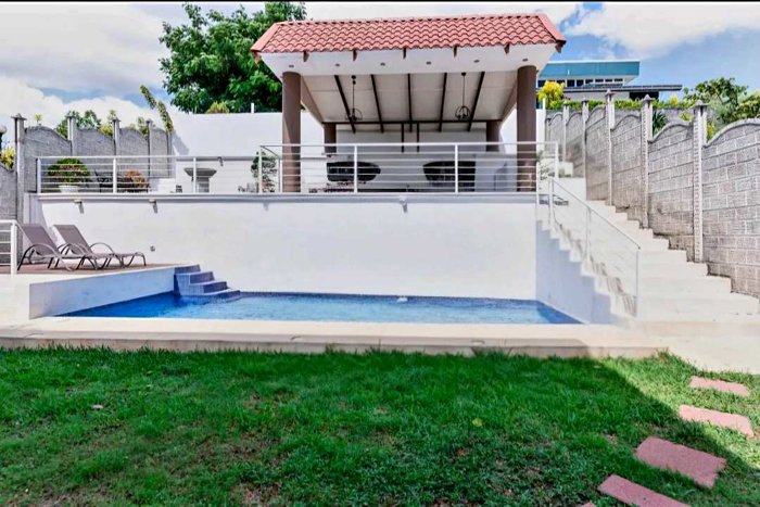Preciosa Casa con Piscina en Condominio, Grecia in Grecia, Alajuela — $350,000 - Photo 2 of 31