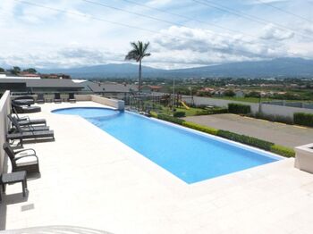 Venta de Casa Moderna en Guachipelin, Escazú / Mls. 25-1578 OFC JB in San Rafael, Escazú, San José — $320,000 - Photo 5 of 20