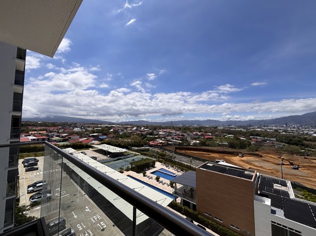 Alquiler de Apartamento con vista y 2 parqueos techados en San Pablo en San Pablo, Heredia — $1,250 - Foto 2 de 19