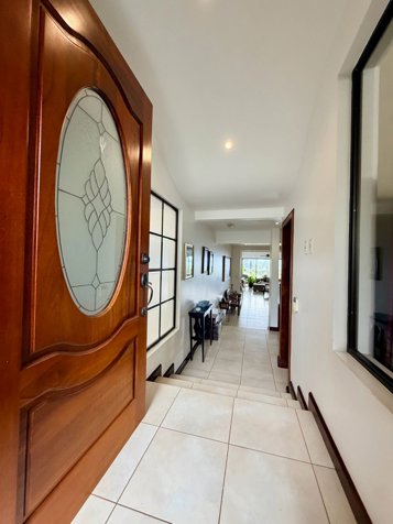 Venta de casa en Colinas de Montealegre, Condominio El Álamo in San Juan, La Unión, Cartago — $625,000 - Photo 3 of 53