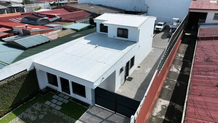 PROPIEDAD DE LUJO CON USO DE SUELO COMERCIAL EN TIBAS. in San Juan, Tibás, San José — $555,000 - Photo 3 of 14
