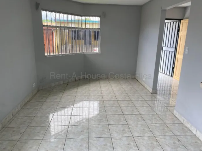 Venta casa esquinera con jardín y cochera techada, cerca de zonas francas #26-1819 GS in San José, Alajuela — $150,215 - Photo 2 of 6