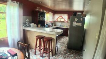 Encantadora casa en venta en Santa Elena del General. Amplio terreno. in San Isidro De El General, Pérez Zeledón, San José — $299,000 - Photo 5 of 15