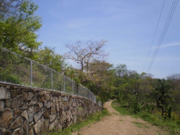 Lote con vista panoramica del Golfo de Nicoya, 1,076 mtrs2 en Paquera, Puntarenas — $30,000
