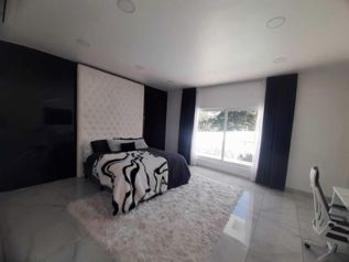 Venta de casa contemporánea de lujo con piscina y mobiliario #26-17 GS en Escazú, San José — $2,400,000 - Foto 5 de 12