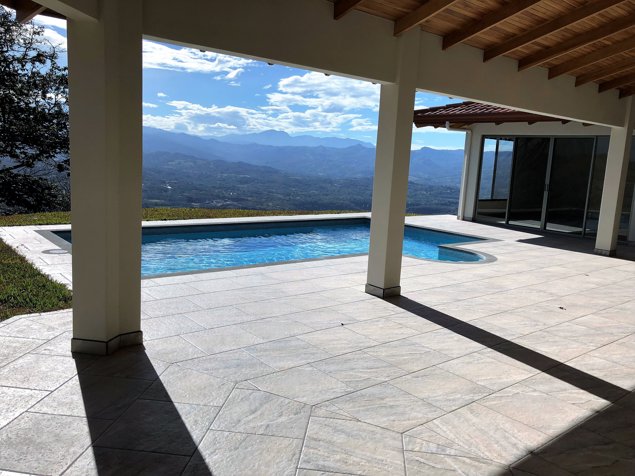 Casa Roca Verde en Atenas con acabados modernos y tradicionales in Atenas, Alajuela — $629,000 - Photo 2 of 24
