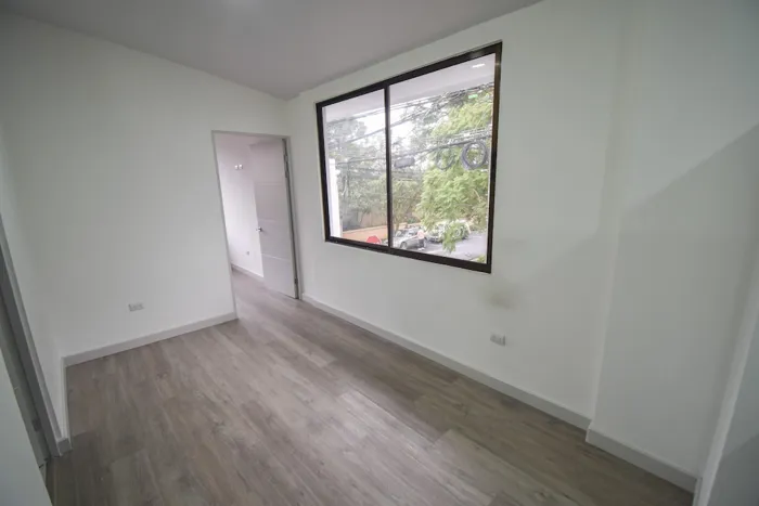 1-Bedroom Apartment with Línea Blanca (White Goods) in Barrio Escalante in Carmen, San José — $115,900 - Photo 3 of 15
