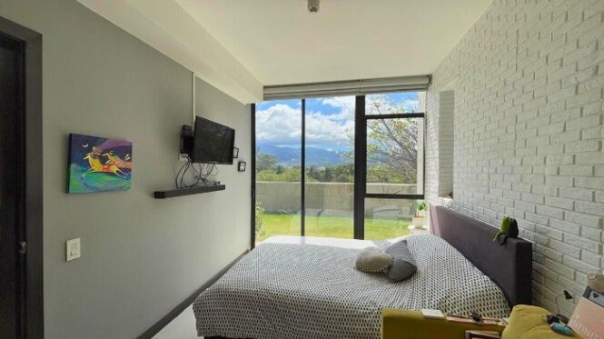Apartamento con Jardín Privado de 57 m² y Amenidades Tipo Club #26-698 GS en Heredia — $190,000