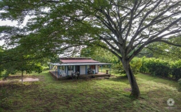 Venta de Lote con Casa en Garabito, Puntarenas.  in Tárcoles, Garabito, Puntarenas — ₡ 65 000 000