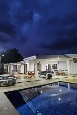 Propiedad con Dos Casas y Piscina en La Fortuna. in La Fortuna, San Carlos, Alajuela — $270,000
