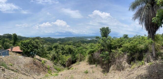 Lote con vista panoramica del Golfo de Nicoya, 1,076 mtrs2 en Paquera, Puntarenas — $30,000