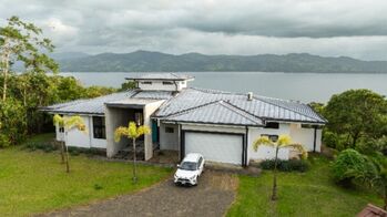 Luxury Home with 4 Bedrooms and Breathtaking Lake & Mountain Views in Arenal, Tilarán, Guanacaste — $1,400,000 - Photo 4 of 21