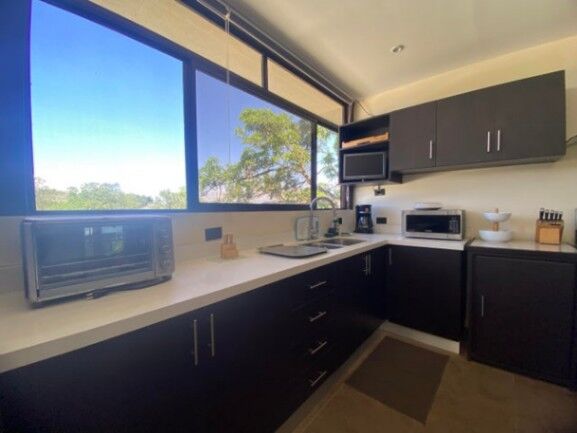 Se vende espaciosa casa con terraza en Ciudad Colón 25-368 in Colón, Mora, San José — $340,000