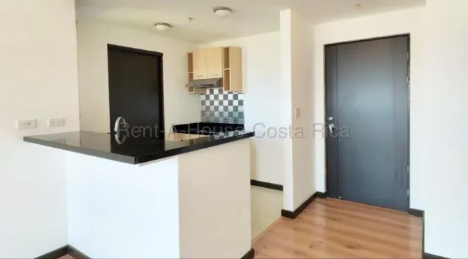 Venta apartamento moderno con balcón y 2 parqueos en torre exclusiva 26-1685 GS en Merced, San José — $175,000