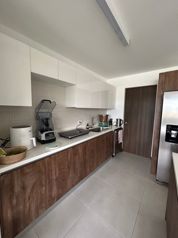 Apartamento en venta - Guachipelin - SM 1459 in Pozos, Santa Ana, San José — $195,000 - Photo 2 of 6