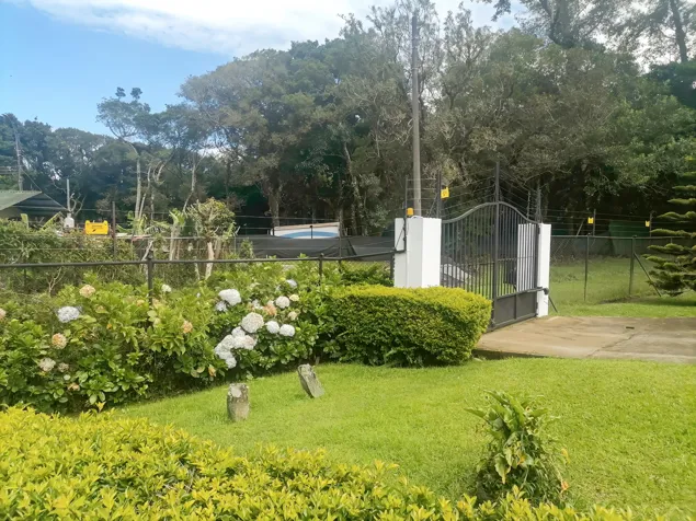 VENTA DE CASA CON LOTE DE 1.478 M² EN EL TIROL, SAN RAFAEL DE HEREDIA en Ángeles, San Rafael, Heredia — $495,000 - Foto 3 de 13