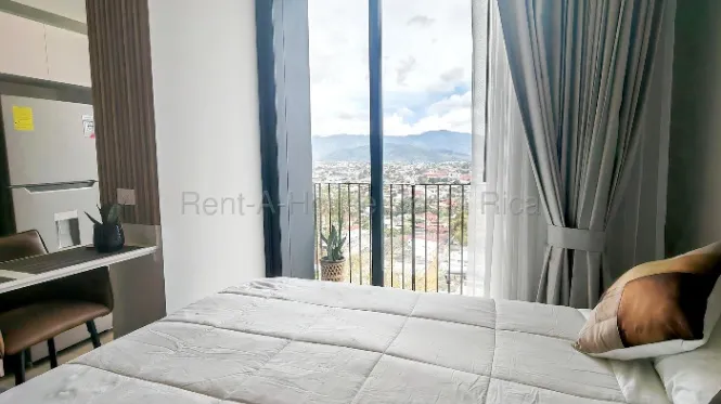 Se alquila moderno apartamento tipo estudio, Torre Escalante en Carmen, San José — $1,200 - Foto 3 de 12