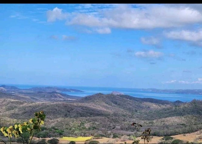 VENTA TERRENO EN LA CRUZ GUANACASTE SOBRE RUTA INTERMERICANA en La Cruz, Guanacaste — $250,000