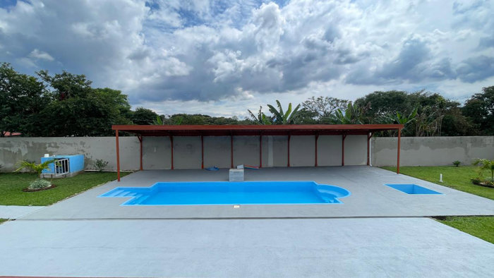 Contemporary Home with Pool, Terrace, and Expansive Gardens- Grecia in San José, Grecia, Alajuela — $398,000 - Photo 3 of 27