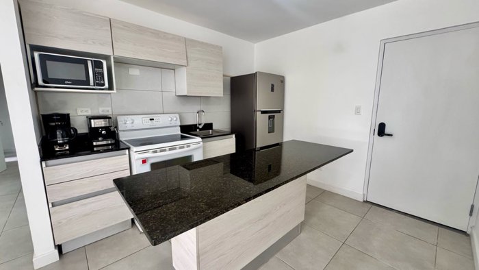 Venta Apartamento Primer Piso Línea Blanca y Jardín en Curridabat in Granadilla, Curridabat, San José — $160,000 - Photo 3 of 38