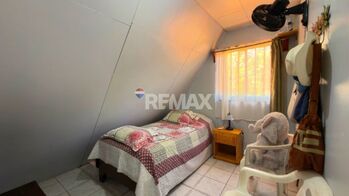 CASA DE 2 PLANTAS CON LOTE DE 879 M² EN VENTA EN LAS MERCEDES DE CAJÓN in Cajón, Pérez Zeledón, San José — $110,000 - Photo 4 of 11