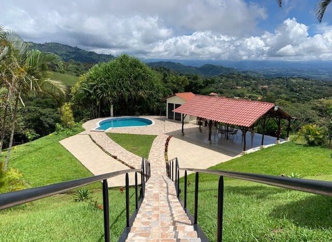 Amazing colonial-style home with guest home and storage in Atenas, Alajuela — $1,600,000