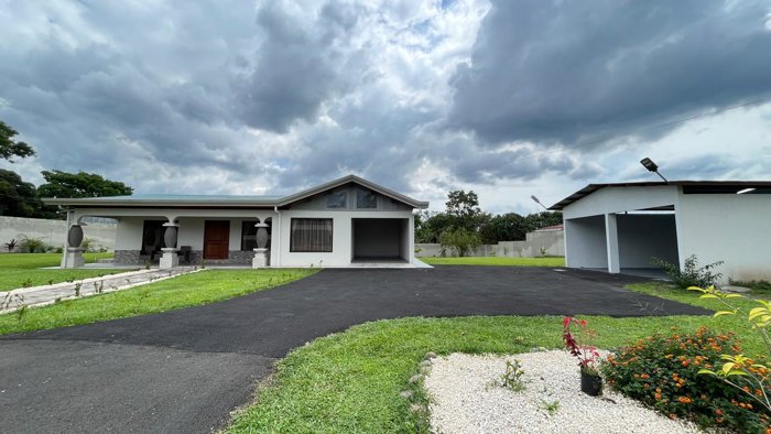 Contemporary Home with Pool, Terrace, and Expansive Gardens- Grecia in San José, Grecia, Alajuela — $398,000 - Photo 2 of 27